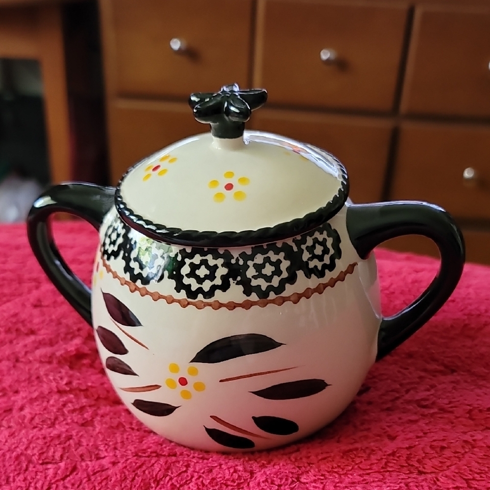 Temptations by Tara Old World" covered sugar bowl or ginger jar in black trim